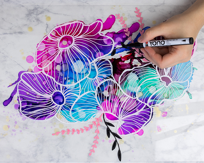 A kész fluid art kép a keretben
